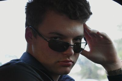 Close-up of young man wearing sunglasses