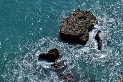 Close-up of rock in sea