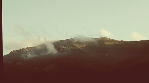 Panoramic view of mountains against sky