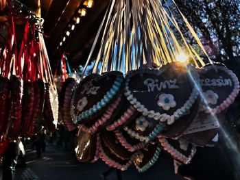 Close-up of heart shape decoration hanging at night