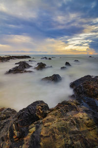 Scenic view of sea against sky during sunset