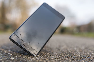 Close-up of broken smart phone