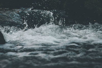 Close-up of waves splashing in sea