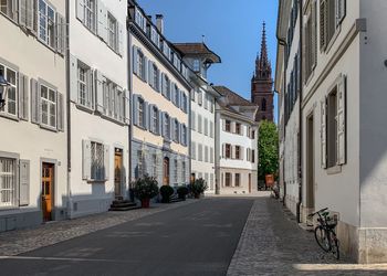 Street amidst buildings against sky in basel