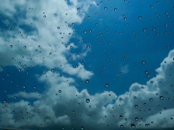 Full frame shot of wet glass window