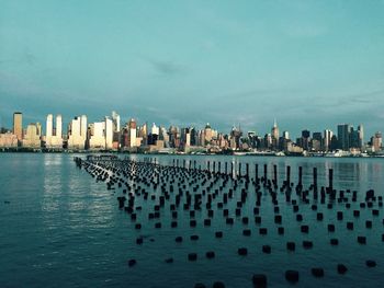 Scenic sunset view of manhattan across the hudson river in new jersey.