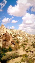 Scenic view of cliff against sky