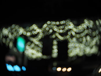 Close-up of illuminated lights at night