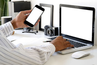 Man using laptop on table