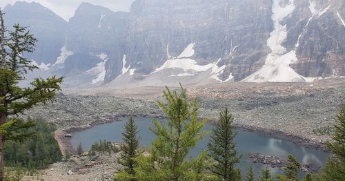 Scenic view of lake by mountains