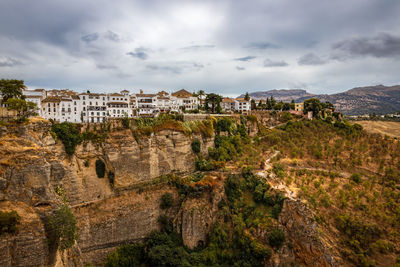 High angle view of townscape against sky. ronda city on a mountaintop in the andalusian