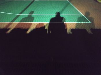 High angle view of man shadow on wall