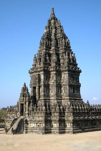 Low angle view of historic prambanan temple against sky