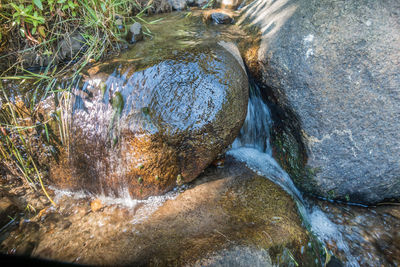 High angle view of water flowing in river