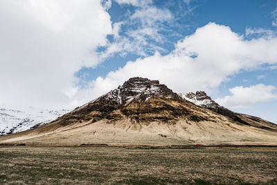 Scenic view of snowcapped mountain against sky