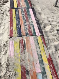 High angle view of multi colored umbrellas on footpath