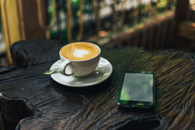 Coffee cup on table