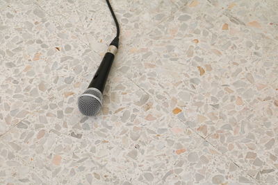 High angle view of microphone on floor