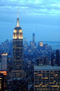 City skyline against cloudy sky