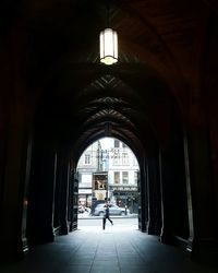 Man walking in corridor