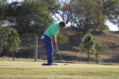 Man standing on golf course