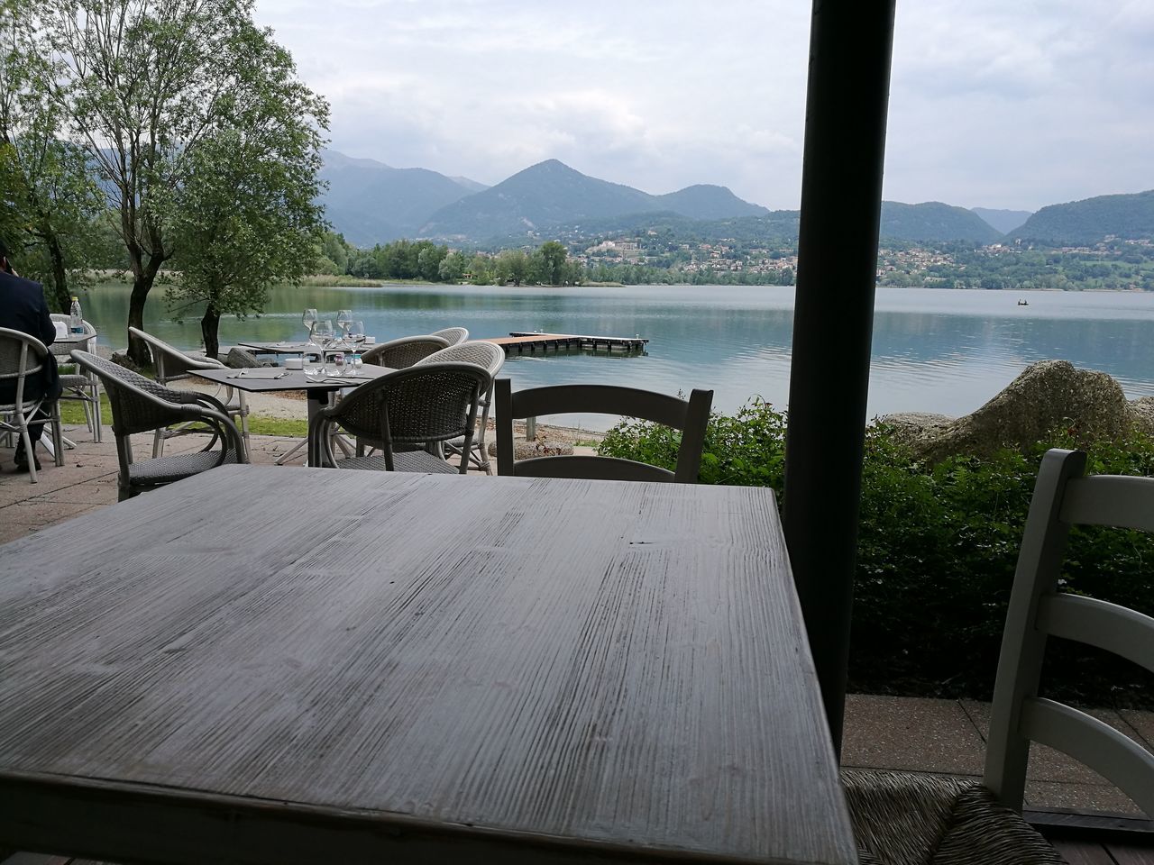 chair, table, mountain, empty, absence, water, lake, nature, no people, wood - material, mountain range, day, furniture, scenics, sky, tree, outdoors