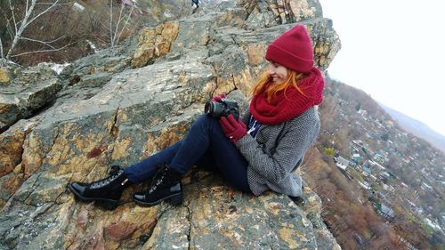 Full length of woman on snow covered mountain