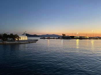 Scenic view of sea against clear sky during sunset