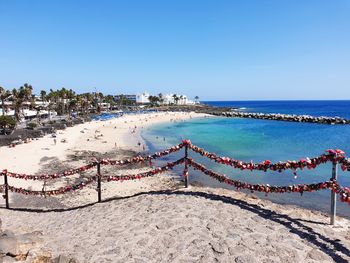 Scenic view of sea against clear blue sky