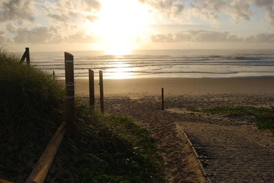 Scenic view of sea against sky at sunset