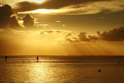 Scenic view of sea at sunset