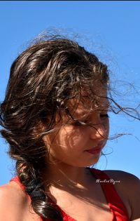 Close-up portrait of a serious young woman