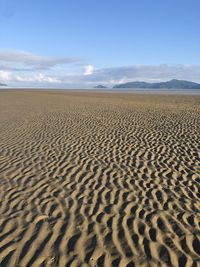 Scenic view of desert against sky