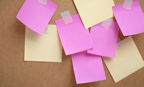 Close-up of sticky notes on cardboard box