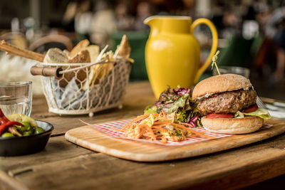 Close-up of burger in basket on table