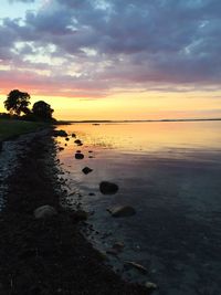 Scenic view of sea against sky at sunset