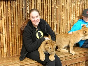 Portrait of smiling young man with dog