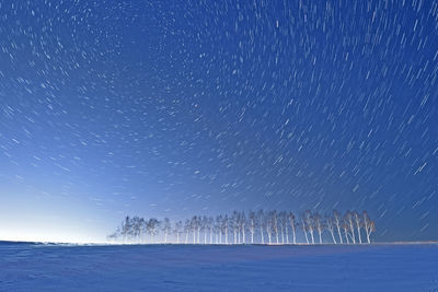 Scenic view of sea against sky at night