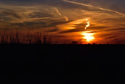 Scenic view of dramatic sky during sunset