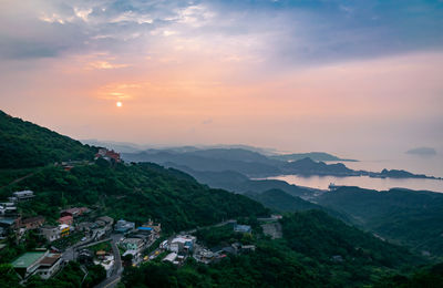 High angle view of townscape against sky during sunset