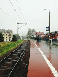 Railroad tracks against sky