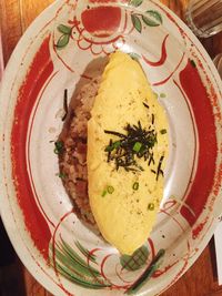 Directly above shot of lemon slice in plate on table