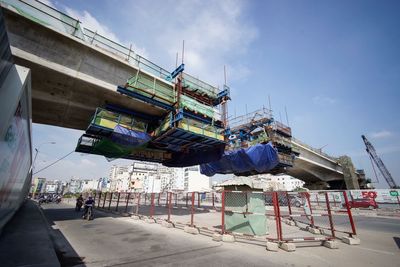 Low angle view of man working at construction site