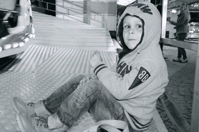 Portrait of boy sitting in kitchen