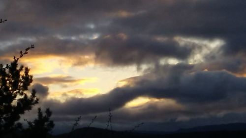 Scenic view of dramatic sky during sunset