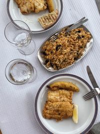 High angle view of seafood lunch served on table