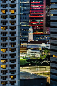 Buildings in city at night