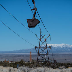 Mining hauler bucket with scenic mountain in background
