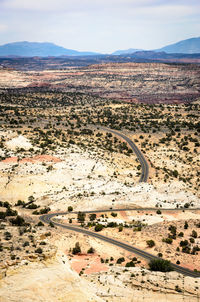 High angle view of road on land against sky