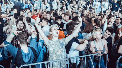 High angle view of people standing against the wall